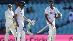 Not out batsman India's Ravichandran Ashwin, right, and Hanuma Vihari walk from the field following play on the final day of the third cricket test between India and Australia at the Sydney Cricket Ground, Sydney, Australia, Monday, Jan. 11