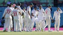 Indian batsman Ravichandran Ashwin and Hanuma Vihari, blue helmets, react as Australian players look on at the end of play on the final day of the third cricket test between India and Australia at the Sydney Cricket Ground, Sydney, Australia, Monday, Jan. 11