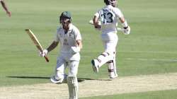 Australia's Marnus Labuschagne celebrates on reaching his century during play on the first day of the fourth cricket test between India and Australia at the Gabba, Brisbane, Australia, Friday, Jan. 15