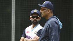 Ajinkya Rahane of India (L) speaks with India head coach Ravi Shastri during an Indian Nets Session at the Melbourne Cricket Ground on December 23