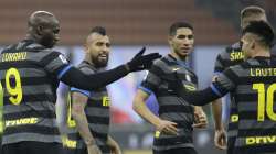 Inter Milan's Romelu Lukaku, left, celebrates with his teammate Lautaro Martinez, right, his goal against Benevento during a Serie A soccer match between Inter Milan and Benevento at the San Siro stadium in Milan, Italy, Saturday, Jan. 30