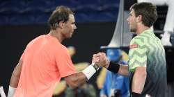 Spain's Rafael Nadal, left, shakes hands with Britain's Cameron Norrie after winning their third round match a the Australian Open tennis championships in Melbourne, Australia, Saturday, Feb. 13