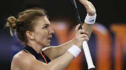 Romania's Simona Halep celebrates after defeating Australia's Ajla Tomljanovic in their second round match at the Australian Open tennis championship in Melbourne, Australia, Wednesday, Feb. 10