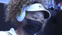 Japan's Naomi Osaka walks out onto court for her match against Britain's Katie Boulter during a tuneup event ahead of the Australian Open tennis championships in Melbourne, Australia, Wednesday, Feb. 3