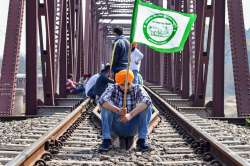 Ambala: Protesting farmers block railway tracks as part of the nationwide Rail Roko Andolan, at Shahpur in Ambala, Thursday, Feb. 18, 2021. (PTI Photo)