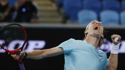 Canada's Denis Shapovalov reacts after defeating Italy's Jannik Sinner during the first round match at the Australian Open tennis championship in Melbourne, Australia, Monday, Feb. 8