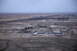 FILE - This Dec. 29, 2019, aerial file photo taken from a helicopter shows Ain al-Asad air base in the western Anbar desert, Iraq. At least 10 rockets targeted a military base in western Iraq that hosts U.S.-led coalition troops on Wednesday, March 3, 2021, the coalition and the Iraqi military said. It was not immediately known if there were any casualties.
?