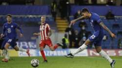 Chelsea's Emerson Palmieri, right, scores his side's second goal during the Champions League, round of 16, second leg soccer match between Chelsea and Atletico Madrid at the Stamford Bridge stadium, London, Wednesday, March 17