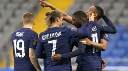 France players celebrate after France's Ousmane Dembele, second right, scored his side's opening goal during the World Cup 2022 group D qualifying soccer match between Kazakhstan and France