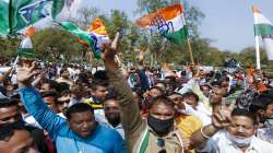 Congress party workers and supporters gather outside the counting office for the Gujarat Municipal Election 2021 results.