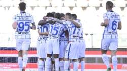 Inter's Romelu Lukako celebrates with teammates after scoring his side's first goal on a penalty kick during the Italian Serie A soccer match between Torino and Inter Milan at the Olimpico Grande Torino stadium in Turin, Italy, Sunday, March 14