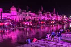 Devotees light earthen lamps at illuminated Ram Ki Paidi to celebrate the groundbreaking ceremony of the Ram Temple, in Ayodhya. 