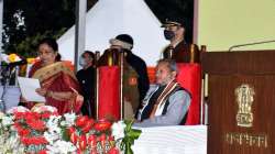 Uttarakhand Governor Baby Rani Maurya administers oath of office to state ministers in the presence of new state CM Tirath Singh Rawat, in Dehradun.