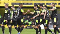 Dortmund midfielder Giovanni Reyna, center, celebrates his goal with teammates during the Bundesliga soccer match between Borussia Dortmund and Werder Bremen in Dortmund, Germany, Sunday, April 18