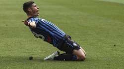 Atalanta's Ruslan Malinovskyj celebrates after scoring his side's first goal during a Serie a soccer match between Atalanta and Juventus, in Bergamo stadium, Sunday, May 18