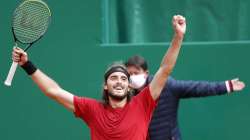 Stefanos Tsitsipas of Greece celebrates after defeating Andrey Rublev of Russia during the Monte Carlo Tennis Masters tournament finals in Monaco, Sunday, April 18