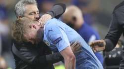 Manchester City's Kevin De Bruyne grimaces as he leaves the pitch during the Champions League final soccer match between Manchester City and Chelsea at the Dragao Stadium in Porto, Portugal, Saturday, May 29