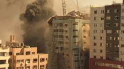 A building housing various international media, including The Associated Press, collapses after an Israeli airstrike on Saturday. The airstrike Saturday came roughly an hour after the Israeli military ordered people to evacuate the building. There was no immediate explanation for why the building was targeted. The building housed The Associated Press, Al-Jazeera and a number of offices and apartments.