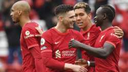 Liverpool's Sadio Mane, right, celebrates scoring his sides second goal during the English Premier League soccer match between Liverpool and Crystal Palace at Anfield stadium in Liverpool, England, Sunday, May 23