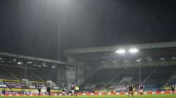 Heavy rain falls during the English Premier League soccer match between Burnley and West Ham United and at Turf Moor stadium in Burnley, England, Monday, May 3