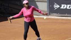 Serena Williams returns the ball during a training session at the Italian Open tennis tournament, in Rome, Monday, May 10