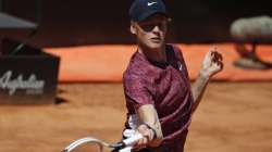 Jannik Sinner of Italy returns the ball to Ugo Humbert of France during their match at the Italian Open tennis tournament, in Rome, Monday, May 10, 2021