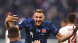 Slovakia's Milan Skriniar celebrates after scoring his side's second goal during the Euro 2020 soccer championship group E match between Poland and Slovakia at Gazprom arena stadium in St. Petersburg, Russia, Monday, June 14