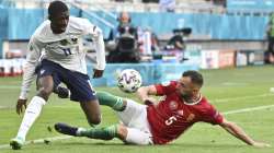 Hungary's Attila Fiola, right, challenges France's Ousmane Dembele during the Euro 2020 soccer championship group F match between Hungary and France at the Ferenc Puskas stadium in Budapest, Hungary Saturday, June 19