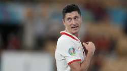 Poland's Robert Lewandowski celebrates after the Euro 2020 soccer championship group E match between Spain and Poland at La Cartuja stadium in Seville, Spain, Saturday, June 19