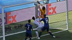 Slovakia's goalkeeper Martin Dubravka scores an own-goal while attempting to clear the ball during the Euro 2020 soccer championship group E match between Slovakia and Spain at La Cartuja Stadium in Seville, Spain, Wednesday June. 23