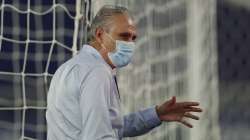 Brazil's coach Tite stands in the pitch prior to a Copa America soccer match against Colombia at Nilton Santos stadium in Rio de Janeiro, Brazil, Wednesday, June 23