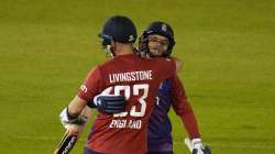 England's Sam Curran, right, hugs teammate England's Liam Livingstone, after defeating Sir Lanka in the second T20 international cricket match between England and Sri Lanka in Cardiff, Wales, Thursday, June 24