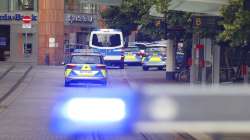 Police cars attend the scene of an incident in Wuerzburg, Germany, Friday. German police say several people have been killed and others injured in a knife attack in the southern city of Wuerzburg.