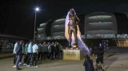 Argentina soccer players attend the unveiling of a Diego Maradona statue outside Madre de Ciudades stadium before their qualifying soccer match for the FIFA World Cup Qatar 2022 against Chile in Santiago del Estero, Argentina, Thursday, June 3