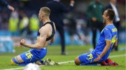 Ukraine's Artem Dovbyk, left, reacts after scoring his team's winning goal during the Euro 2020 soccer championship round of 16 match between Sweden and Ukraine at Hampden Park in Glasgow, Scotland, Tuesday, June 29