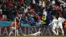 England's Harry Kane, center, celebrates after scoring his side's second goal during the Euro 2020 soccer championship round of 16 match between England and Germany at Wembley stadium in London, Tuesday, June 29