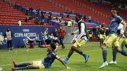 Colombia's Luis Diaz celebrates scoring his side's third goal against Peru during the Copa America third place soccer match at the National stadium in Brasilia, Brazil, Friday, July 9