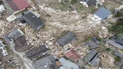 Debris between houses is seen close to the Ahr river in Schuld, Germany