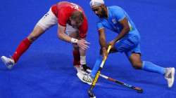 Britain's David Ames, left, and India's Simranjeet Singh