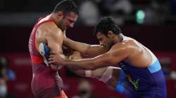 San Marino's Myles Nazem Amine (left) and India's Deepak Punia