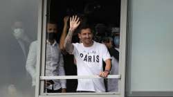 Lionel Messi waves after arriving at Le Bourget airport, north of Paris, Tuesday, Aug. 10