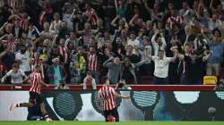 Brentford's Christian Norgaard, center, celebrates after scoring his side's second goal during the English Premier League soccer match between Brentford and Arsenal at the Brentford Community Stadium in London, England, Friday, Aug. 13