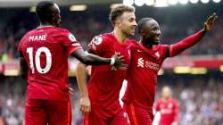 Liverpool's Diogo Jota, center, celebrates scoring with teammates 