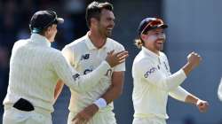 James Anderson with skipper Joe Root and Joe Burns