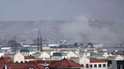 Smoke rises from explosion outside the airport in Kabul, Afghanistan, Thursday, Aug. 26, 2021. 