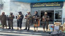 Taliban fighters stand guard inside the Hamid Karzai International Airport after the U.S. withdrawal in Kabul, Afghanistan, Tuesday, Aug. 31, 2021. The Taliban were in full control of Kabul's international airport on Tuesday, after the last U.S. plane left its runway, marking the end of America's longest war. (AP Photo/Kathy Gannon)
?