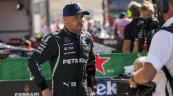 Mercedes driver Valtteri Bottas of Finland answers media's questions after completing the qualifying session for Sunday's Formula One Dutch Grand Prix at the Zandvoort racetrack, Netherlands, Saturday, Sept. 4