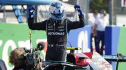 Mercedes driver Valtteri Bottas of Finland celebrates winning the Sprint Race qualifying session at the Monza racetrack, in Monza, Italy , Saturday, Sept.11