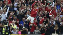 Manchester United's Cristiano Ronaldo celebrates after scoring his side's second goal during the English Premier League soccer match between Manchester United and Newcastle United at Old Trafford stadium in Manchester, England, Saturday, Sept. 11