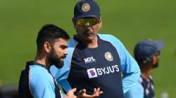 Virat Kohli chats with head coach Ravi Shastri